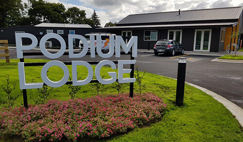 Lobell commercial construction - Podium Lodge sign